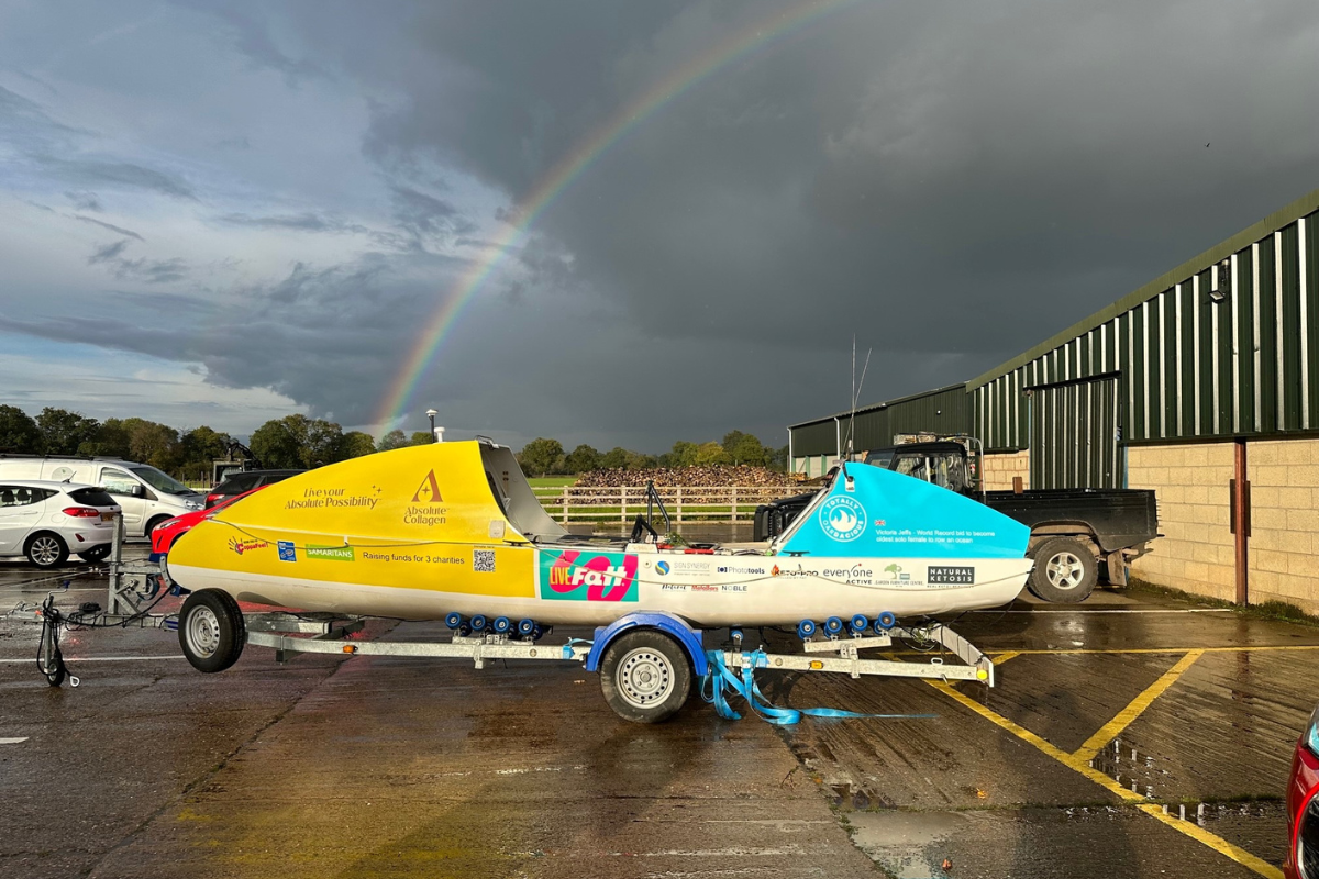 YDSA CHAIRMAN, TIM BARKER, SURVEYS ROWING BOAT WHICH WILL CROSS THE ATLANTIC